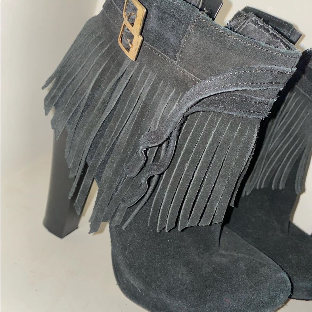 Black booties with fringe and clamps